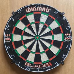 Winmau Blade 4 professional dartboard with addition of 4 steel brackets for easy mounting.

This has had little use (see photos), and having only been used as an occasional practice board is in excellent condition.

£15, collect only.