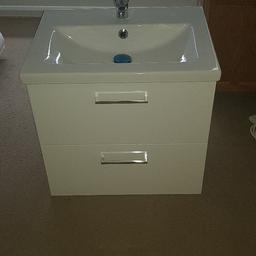 Wall hung vanity unit with basin mixer taps waste trap ect. Ex display few marks brand new never used not needed for a project great quality with soft close drawers. Collection only