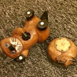 X2 Wooden Cats. Beautiful wooden ornaments, ideal for any cat lover. One is a candle holder which includes the candle. Selling both for £4. B36 area.