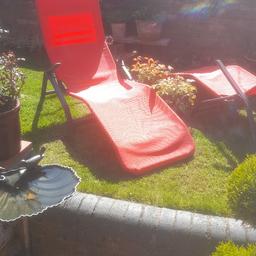Two red garden recliners.
Excellent condition. 
Really comfortable. 
£35 for both or £20 each. 
NO OFFERS PLEASE.