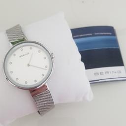 beautiful bering ladies watch ,absolutely new condition .baught as a gift but  ijust dont wear watches. comes with certificate, all original bag and unique case .cost £140.00 to buy.grab a bargain. £60. collection only. thanks for looking.
