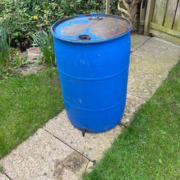 This has been used as a water butt filled from a gutter down pipe. It holds 210 litres and is very robust

Barrel is free of charge. If you also want a down pipe diverter, I have one you can have for £4