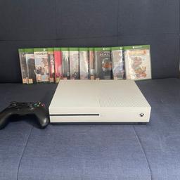Xbox one s and 12 games as shown in picture, fully working complete with mains lead and black controller.