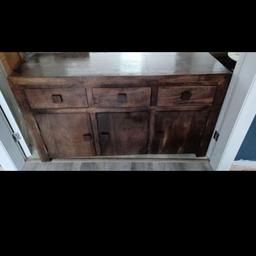 3 drawer/3 cupboard dark mango wood sideboard.
In used condition.
Change of decor forces sale.
COLLECTION ONLY!

Length 135cm x Depth 45cm x Height 75cm
