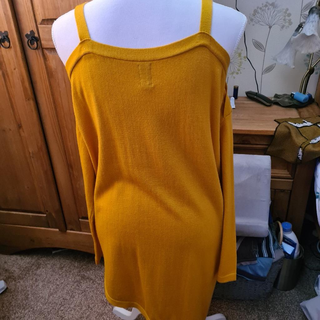 cold shoulder jumper, size 12,never been worn smoke free home, good condition