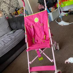 Pink light weight buggy, clean pushchair just left in storage not used!