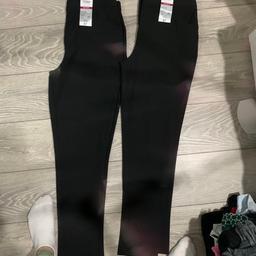 BNWT. 2 Black pairs of trousers.
16-17 years, slim leg plus size.
 (for school maybe)
Please ignore pink and lines in the photos, my camera lens is broken. 
Collection only. 
Thank you 