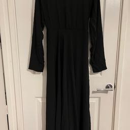 Brand new, very pretty black abaya. Will fit size S/M body. Basically size 10-14. Abaya size 52