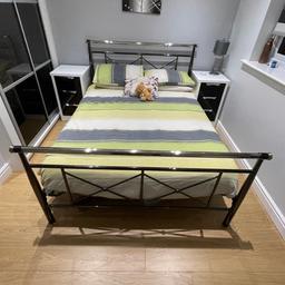 King size metal bed frame and memory foam mattress. Used but in very good condition.
