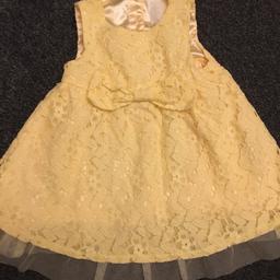 GORGEOUS FULLY LINES LITTLE DRESS WITH BOW.  FULLY LINED WITH LACE ON BOTTOM OF UNDERSKIRTING.  BABY DIDNT GET CHANCE TO WEAR. FTOM F& F. Collect Dukinfield thanks