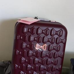 This is a gorgeous suitcase from Ted Baker. It is in a beautiful maroon colour and oozes style. It would make a great gift for yourself or someone special.