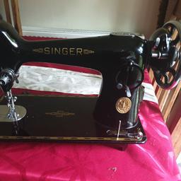 singer sewing machine,the paintwork is beautiful for a machine its age,any questions feel free to ask,also have a case to throw in with it,you need to screw the brackets into it,please if you're going to bid to buy do it when you're planning on collecting 