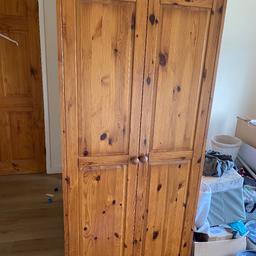 double wardrobe made from solid pine.. two shelves and hanging room.
collection only

175cm tall
82cm wide at the base
79.5cm wide (main part of wardrobe)
54cm deep

reduced in price for quick sale as need the room