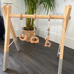 Wooden baby play gym.
Grey and wooden beads
In excellent condition.
Collapsible. Space saving