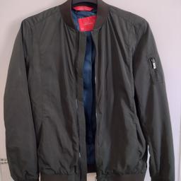 Brand new Men's Zara Green basic man bomber jacket for sale. Size EUR M (This can be converted on the UK Zara men's size guide chart).
No tag attached but has not been worn before.

Collection in Battersea.