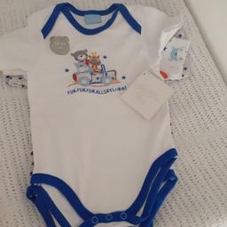 3 pk bodysuits with animals and stars on. 3/6 months. New with tags