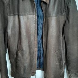 medium size brown leather jacket in good condition from pet and smoke free home