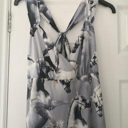 New with tags, Designers at Debenhams dress - Giles edition.
Size 10.
Full length.
Light grey with horse print.
Fully lined.

It was always a little long for me so planned to have it shortened and re hemmed but never got round to it.