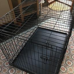 Extra large dog crate. As new, never used. Was £120. Height 76cm. Length 106 cm. Wide 70 cm. Fully collapsible. With tray. 2 openings, one on end and other on side. Cash only please.