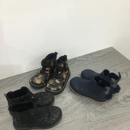3 x pairs girls size 8 boots, one Next, one George and one Tu. Black flashing boots with stars on, Navy suede boots with rabbits on the back and a black floral pair. All used but still in good condition, just need a wipe.