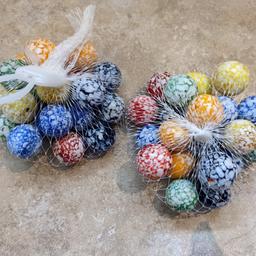 brand new glass marbles.
new
activity play toy . great for.holidays and travel or for home .. Colourful.
Lots of sets available.. ask for combined postage .
2 bags per set.