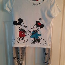 cute pyjama set nice and cool for summer
size 10 bottoms and size 14 top. 
lovely condition.