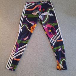 Well worn but still lovely bright condition.
Size 12 but roomy stretchy so easily fit 14