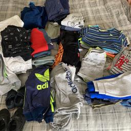 Multiple items of boy’s clothes age 1- 2 1/2 years. All in good condition, some still have labels on them. Including 2 Adidas tracksuits, shorts, t-shirts, pants, long sleeve tops, knitted coats, dressing gown and a couple of sets.