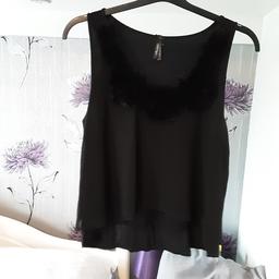 Size 16 imitation fur round front neck longer at the back vgc - please see my other items