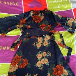 Lovely floral dress, can be worn for summer or even dress it up for a lovely evening. Comes with waist tie. Zip on the side.
Boohoo 
Size 10