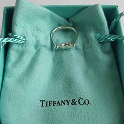 In good condition Tiffany&Co. Tiffany Elsa Peretti Bean Design Ring, size 4 and 3/4 (UK - J). Pouch and box. Trusted seller, see my selling profile for more Tiffany&Co. items. Thank you.