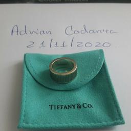 In good condition and retired Tiffany&Co. Tiffany Galaxy Ring, size 5. Pouch only. Trusted seller, see my selling profile for more Tiffany&Co. items. Thank you.