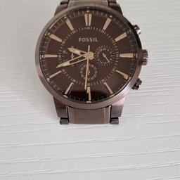 Limited edition mens Fossil chronograph watch, stainless steel finish in brown. Like new, worn only twice. Boxed, with instructions and spare links.

Recent new battery replacement and has a lifetime battery replacement certificate with F Hinds jewellers.

Collection only