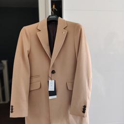 Men's smart coat in size medium

In a camel/tan colour

Not worn, brand new still with packaging and tags on

RRP £69 from retailer

Collection only
