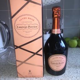 Unopened in box. Champagne