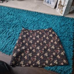 good condition flowery skirt size 14