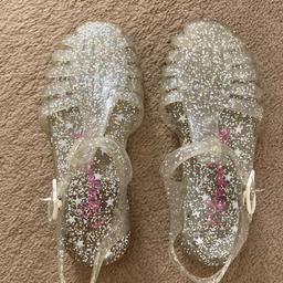 Size 10 clear glittery jelly shoes/ sandals in excellent condition collection only WF2