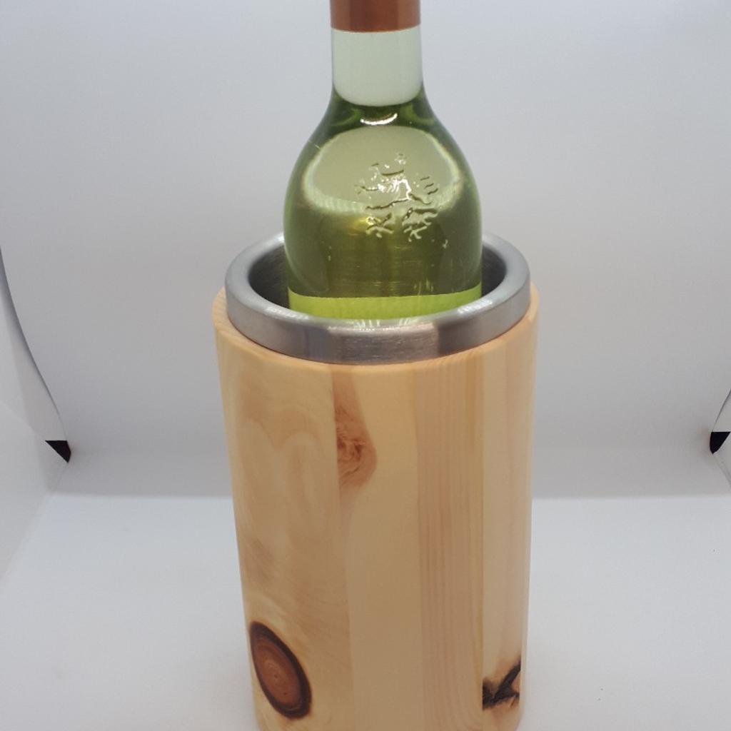 Weinkühler aus Zirbenholz mit Edelstahl Einsatz geölt. Ein schöner Hingucker und riecht auch noch gut.
