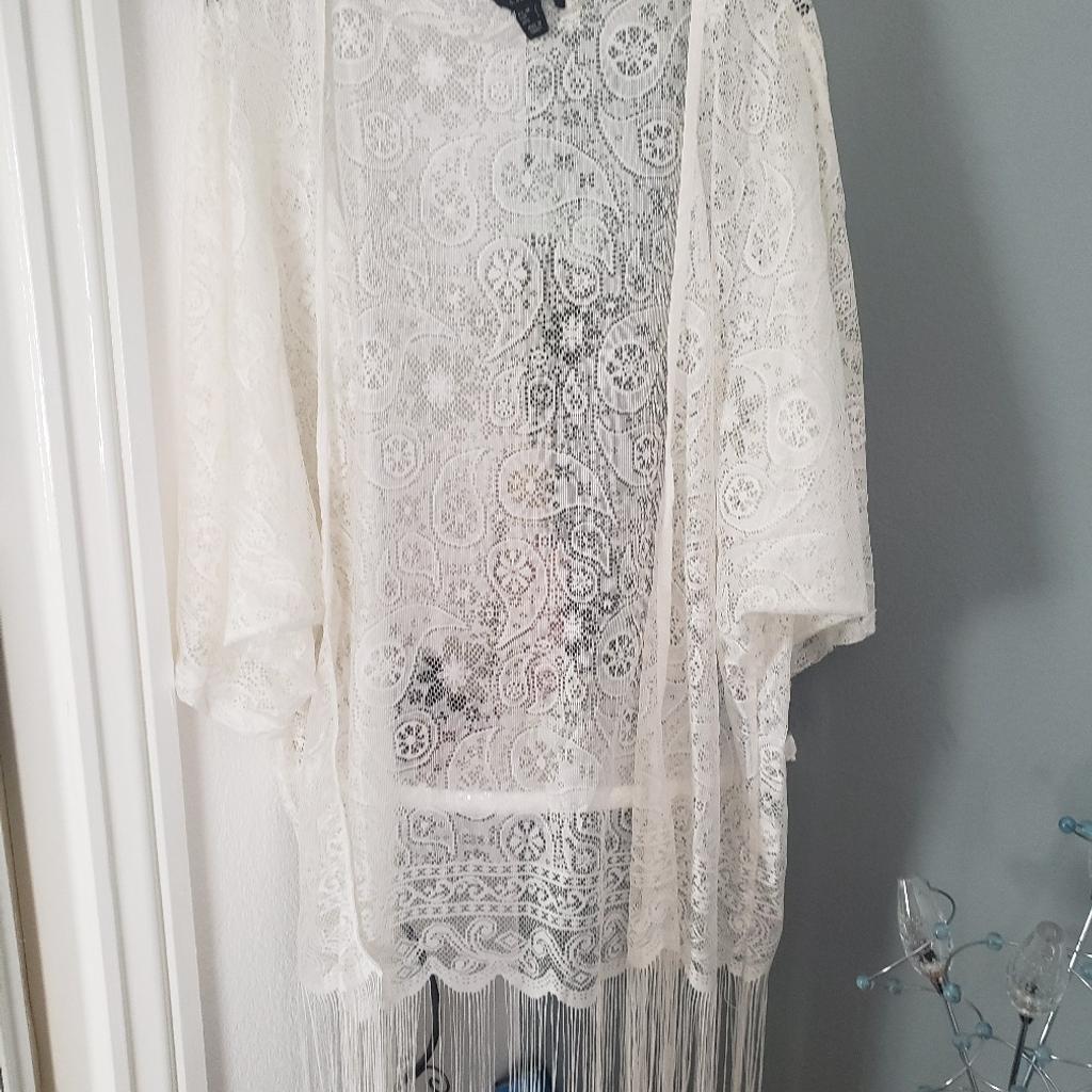 lace cover up for over swimsuit ,with long fringe ,never worn