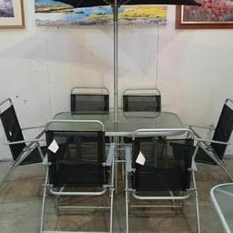 6 Seater Metal Patio Set - Black & Silver fully assembled but all new and we can deliver local but charge £10 delivery 
Table, 6 chairs and parasol 
Glass table top.
Steel garden table.
Table size: H71, W76, L120cm.