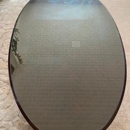 Large oval shape tea table L114cm x W68cm x H40cm in mahogany With over shape toughened glass top to protect from scratching was bought separately. 