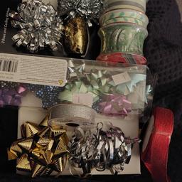 mixture of ribbons ,bows , tiissue paper with matching confetti strips ,