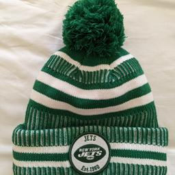 New York Jets NFL hat bought in America a few years ago, the centenary year of NFL. I removed the tags but it's not been worn. one size. it's knit with fleece lining. really nice style and bought as a souvenir really but I think it'll be too warm for me.  in perfect condition.