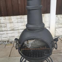 Chiminea with 2 easy light fire logs what burn for up to  2 hours each.