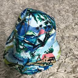 Like New - Worn Once
Fun Summer / Sun Hat
Reversible/ Plain Blue on reverse
1.50
Also available- Matching Short Sleeve Shirt (£2)
Both for £3
