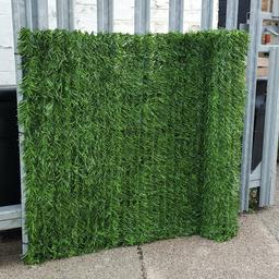 EVERGREEN Artificial Conifer Hedge 3m Long. Ideal for disguising existing walls and fencing or providing privacy around swimming pools and terraces. Can be used indoors for events and parties or outdoors for a permanent screen.
 Length: 3m long x 1m or 1.5m or 2m High
• Height: 1m, 1.5m or 2m
• Approx 10-25mm thick & double sided
• Colour: Two Tone Green
• Shade Rating 100%
• UV Protected & Fire Resistant
• Very low maintenance