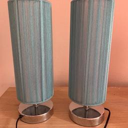 2 teal lamps