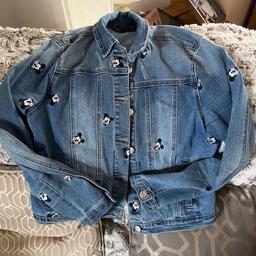 Mickey Mouse denim jacket age 13-14 years . Buyer to collect st Helen’s town centre area