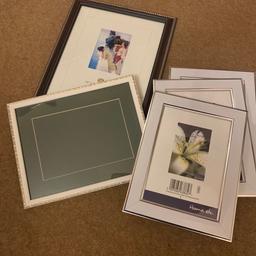 Collection of 6 photo frames

Set of three white photo frames
Size 5 x 7 inches
Plus 2 10 x 8
In white and brown
Grandkids photo black photo frame
All excellent condition and great price