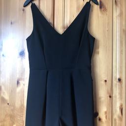 Black occasion Playsuit featuring lace panel and back zip, size 6 by Topshop.
Only worn once so still in great condition.